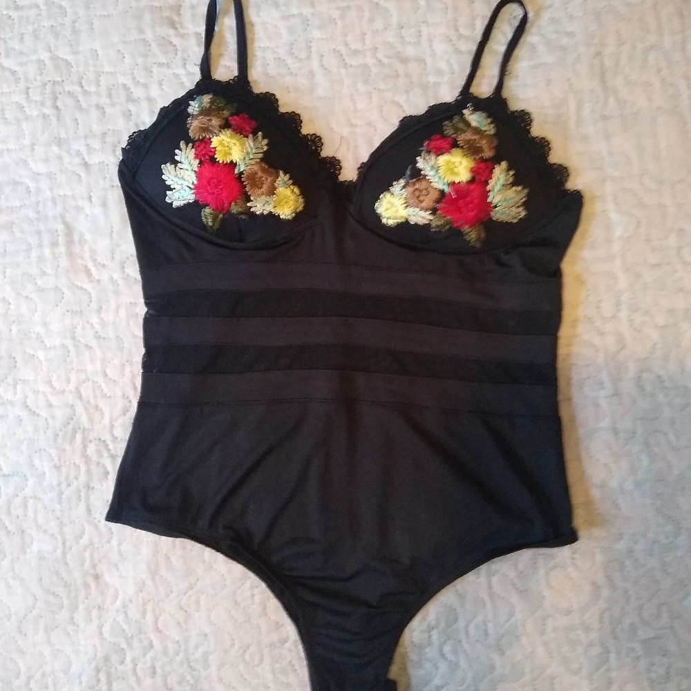 Black mesh bodysuit with knitted detailing